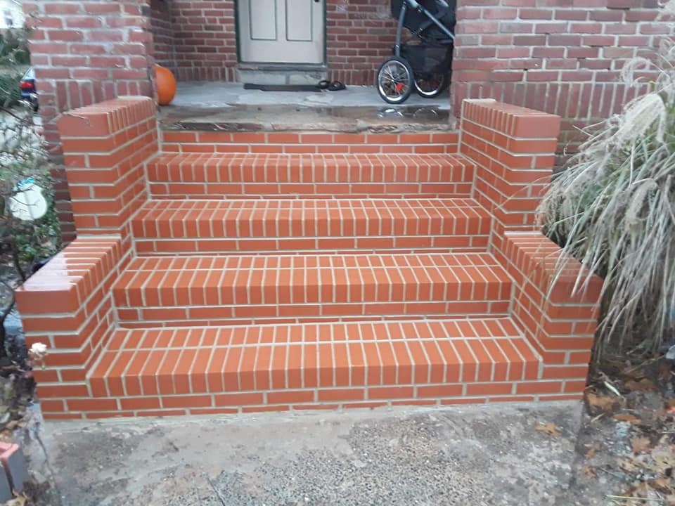 Refinished brick steps by blue jay construction